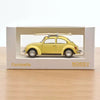 VW Beetle 1303 1973 Pastel Yellow with surfboard 1:43